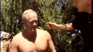 Old men share a slut in the garden