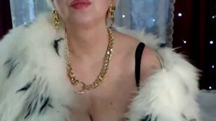 Gorgeous Russian mom smokes in a fur coat and dominates))